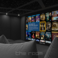 سینمای خصوصی با صفحه نمایش بزرگ و کاناپه راحتی سفارشی.